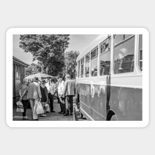 Vintage bus collecting passengers in the Norfolk town of Sheringham Sticker